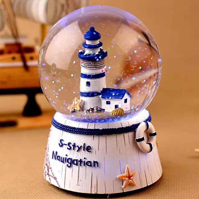 Musical Light House Snow Globe.