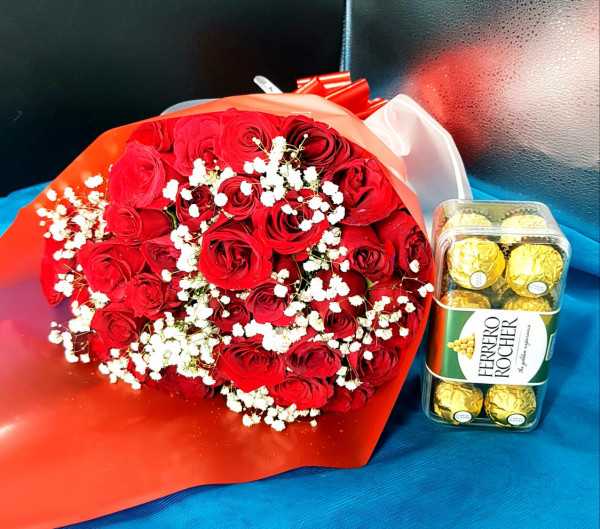 Blooming Red Roses Bouquet With Chocolates.